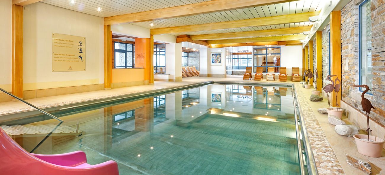 Indoor pool and wellness area at the Hinteregger family hotel
